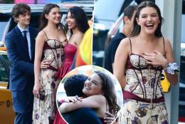 Beaming Suri Cruise, 18, is the spitting image of mom Katie Holmes at prom with pals