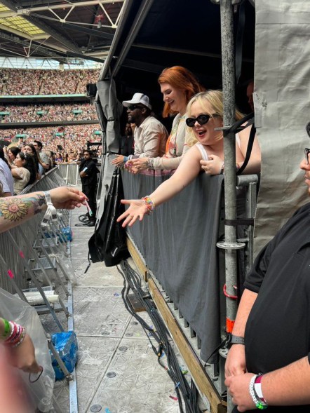 Nicola Coughlan trades friendship bracelets with fans as she attends the eras tour.