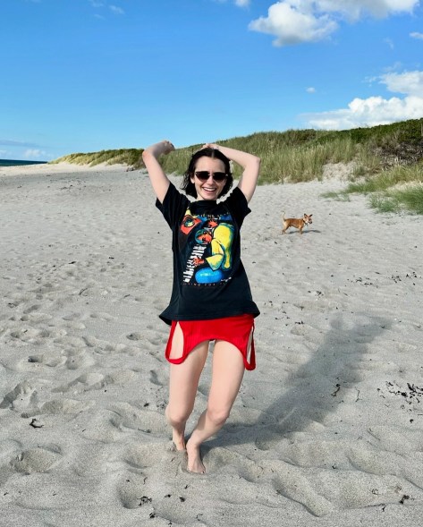 lily collins being silly on the beach