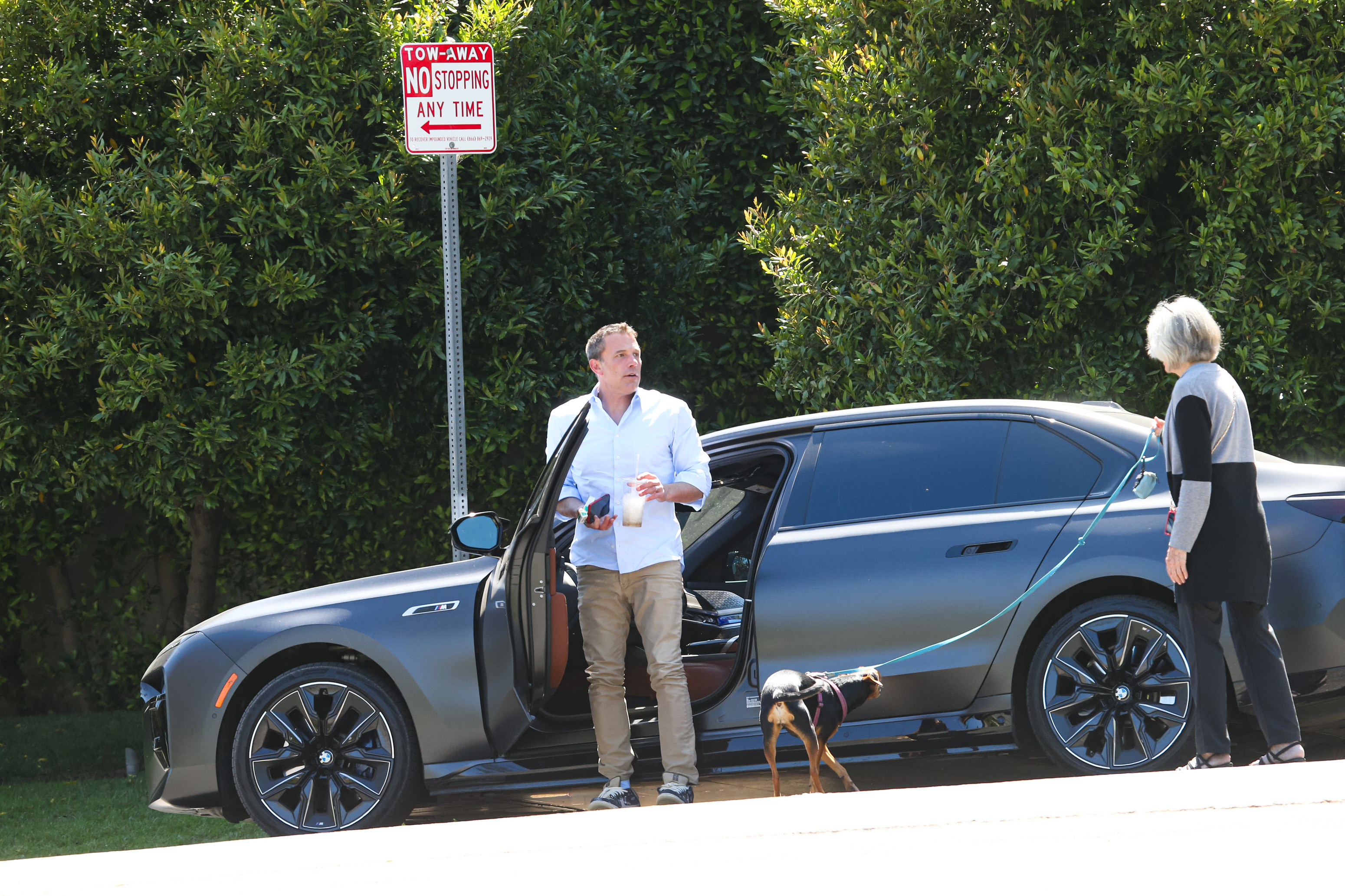 Ben Affleck getting out of a car to see his mom