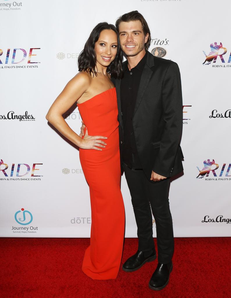 Cheryl Burke and Matthew Lawrence posing together