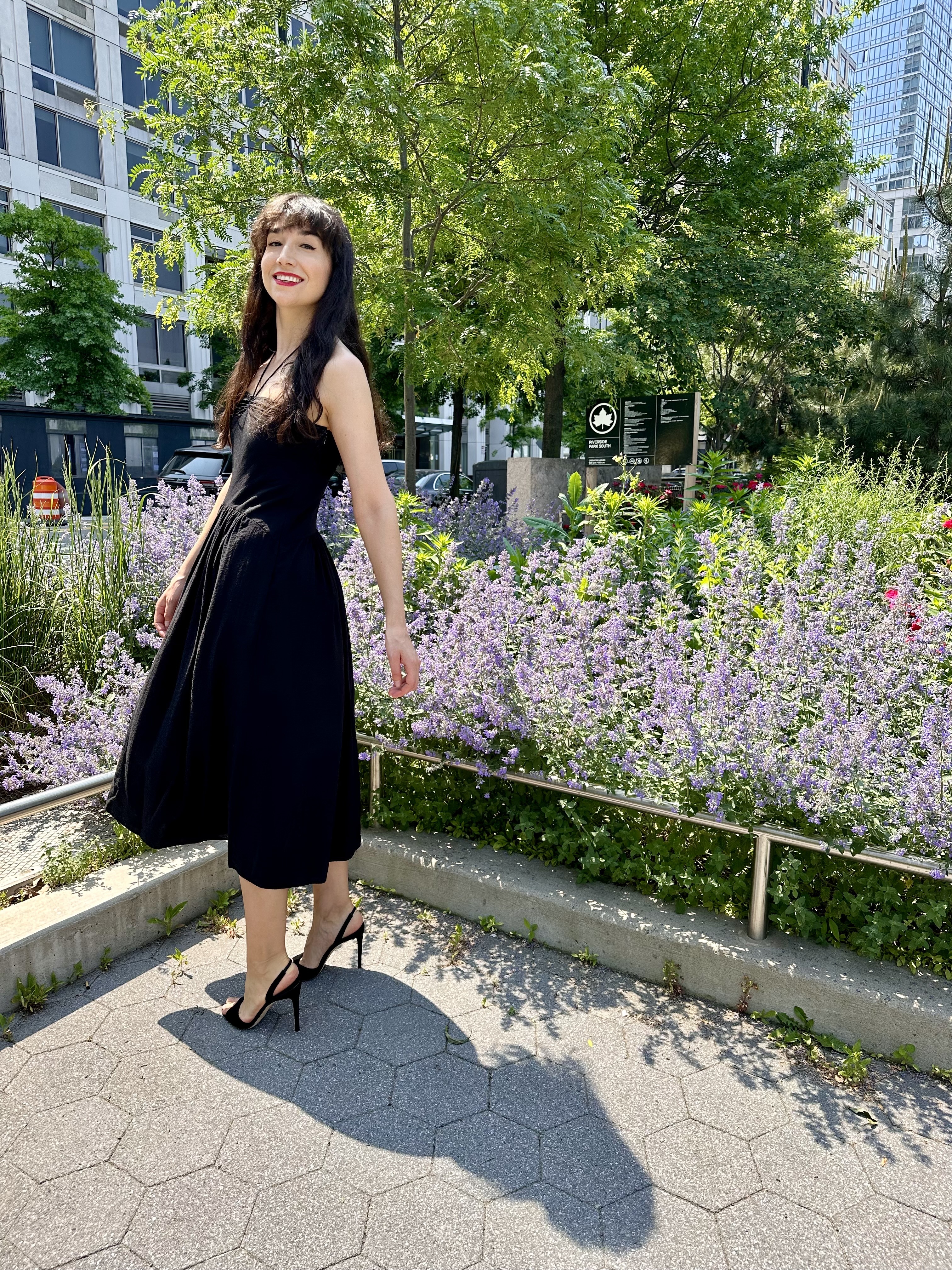 A woman wearing high heels in a park