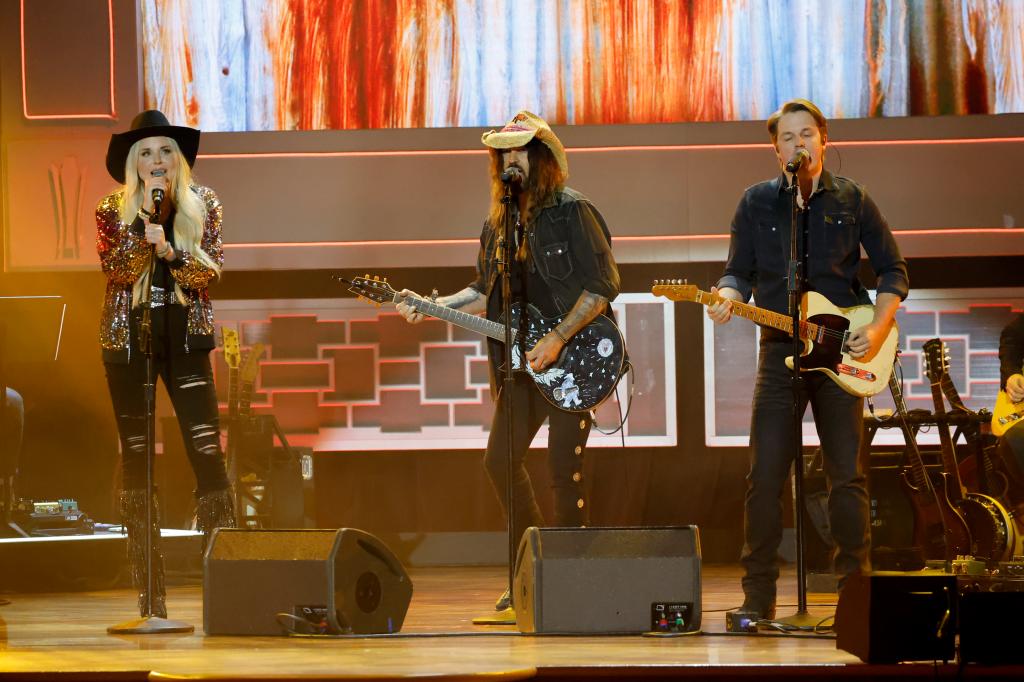 Firerose and Billy Ray on stage together alongside Travis Denning at the 16th Annual Academy of Country Music Honors  at Ryman Auditorium on August 23, 2023.