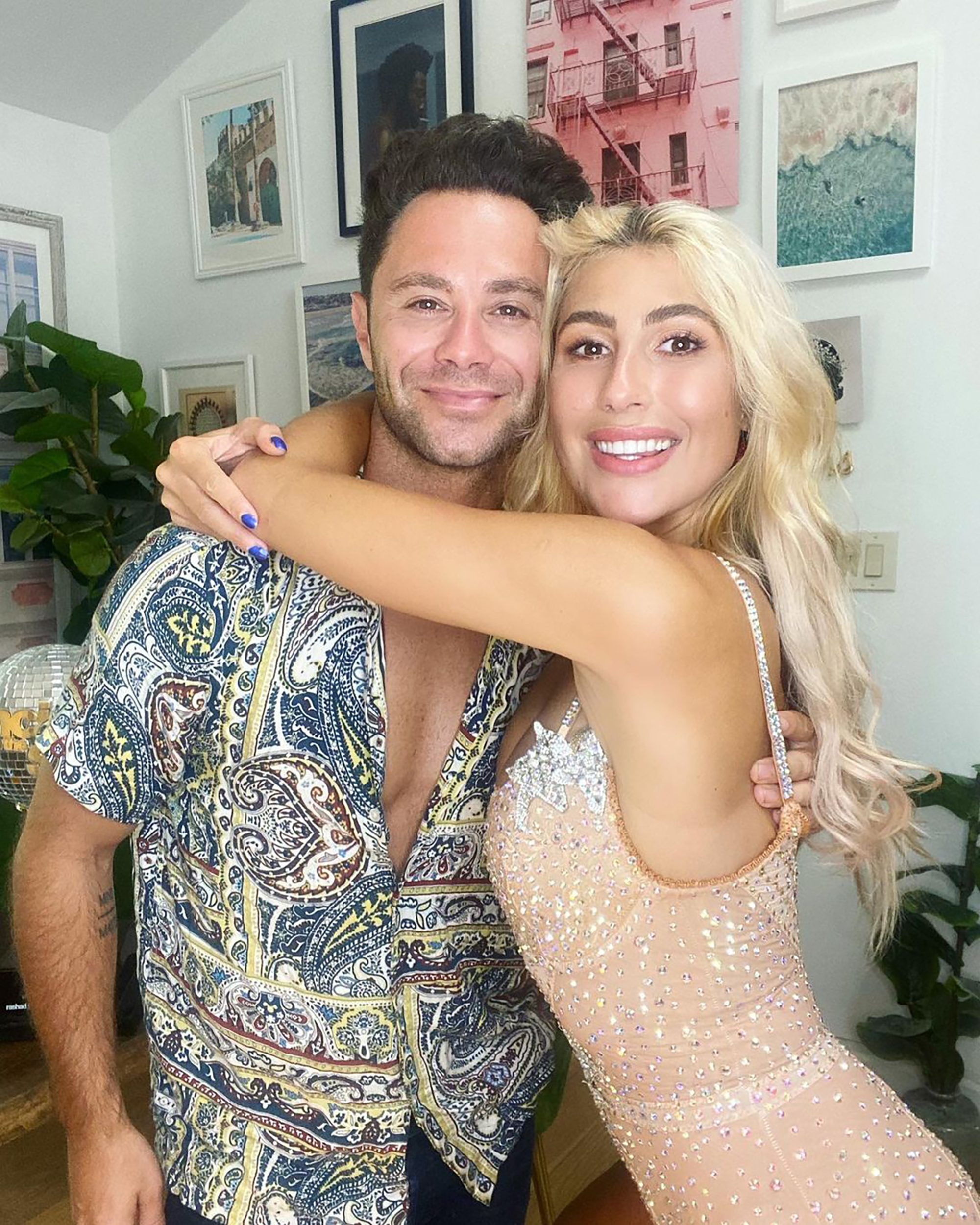 Emma Slater and Sasha Farber posing together