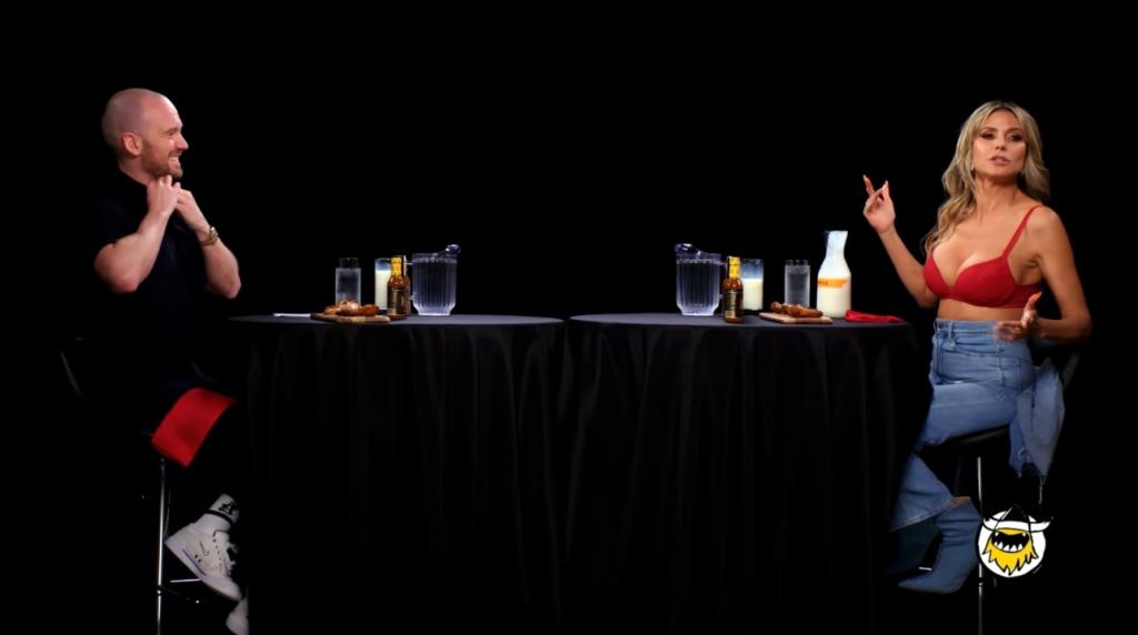 Sean Evans and Heidi Klum on "Hot Ones."