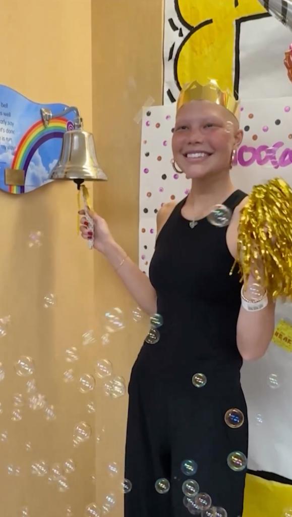 Isabella Strahan ringing the bell.