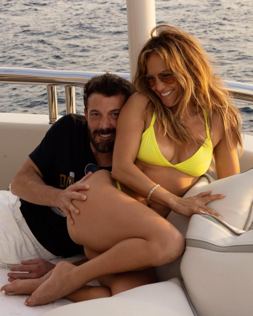 Jennifer Lopez and Ben Affleck pose on a boat.