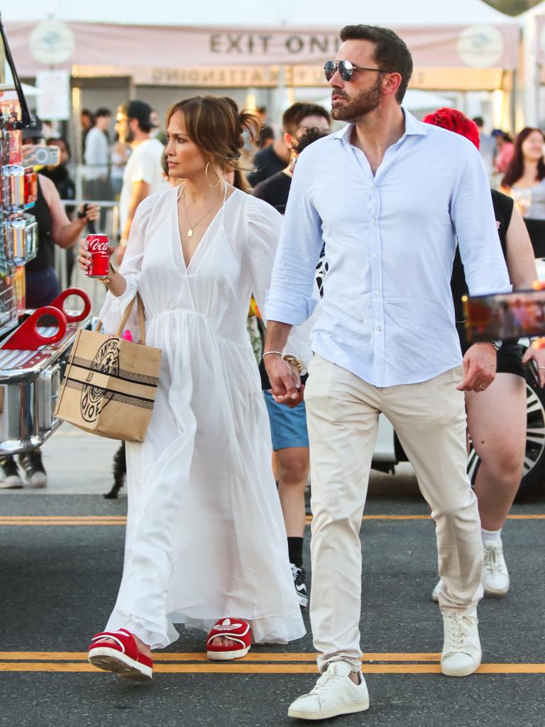 Jennifer Lopez and Ben Affleck holding hands