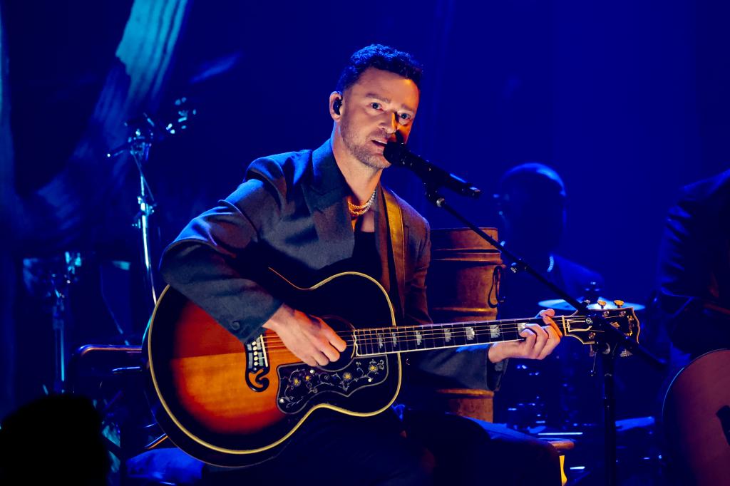 Justin Timberlake plays guitar.