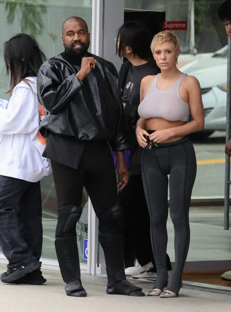 Bianca Censori and Kanye West shopping.