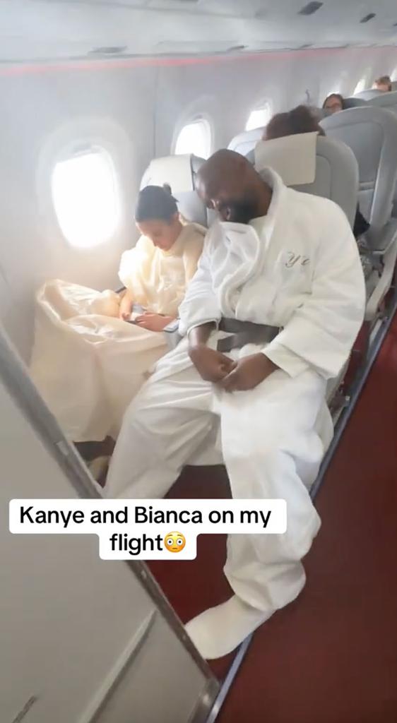 Kanye West and Bianca Censori sitting in a plane together.