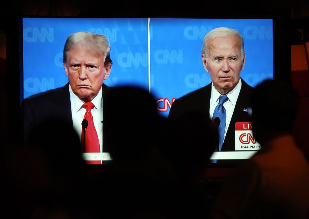 Joe Biden and Donald Trump debating. 