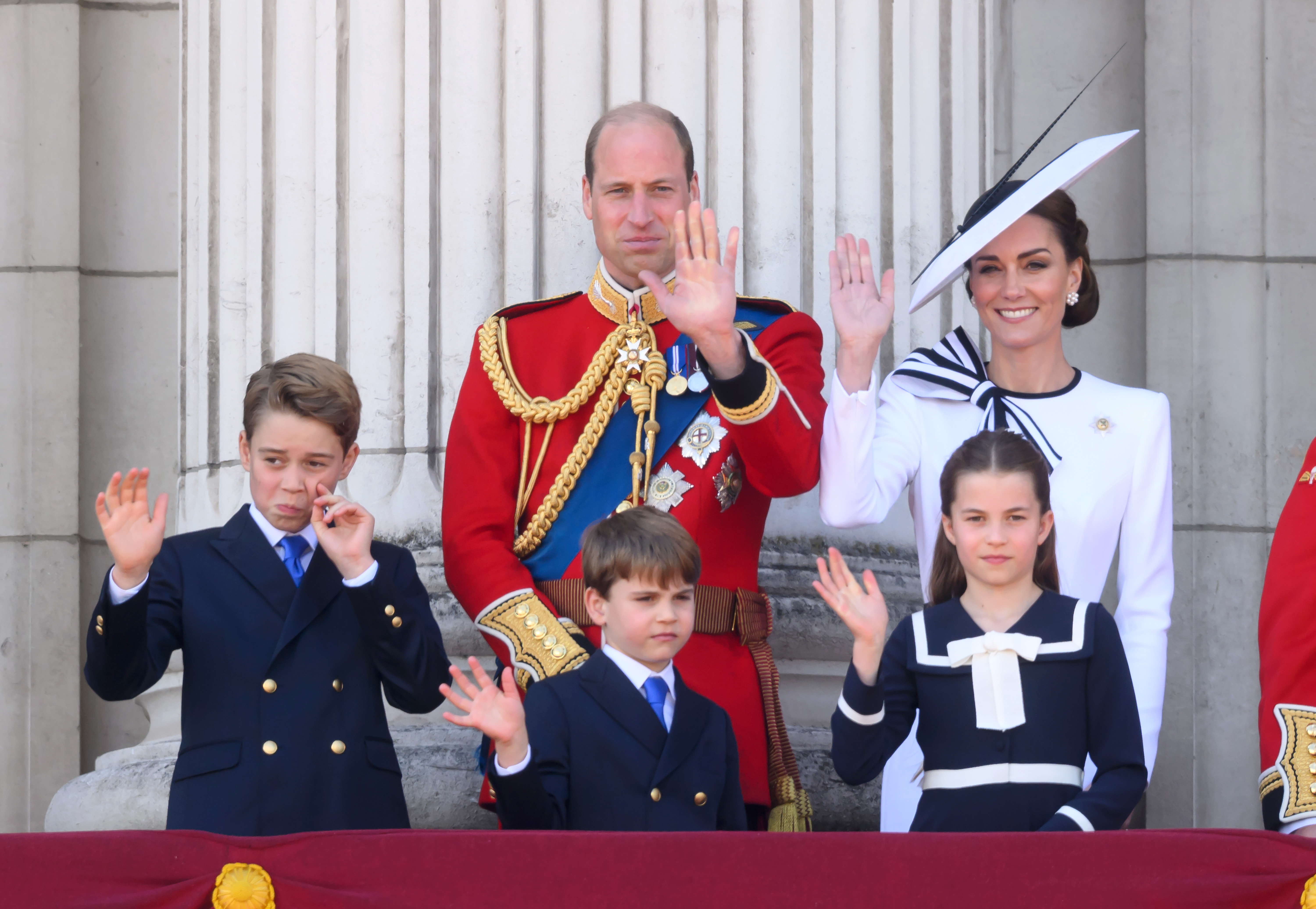 Kate Middleton, Prince William and their three kids on the Buckingham Palace balcony.