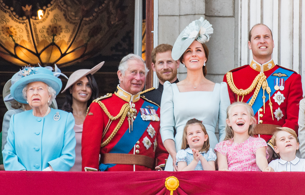 The royal family at a balcony in Buckingham Palace.