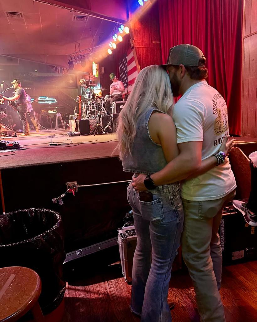 Lizzy Musi and Jeffrey Earnhardt hugging. 