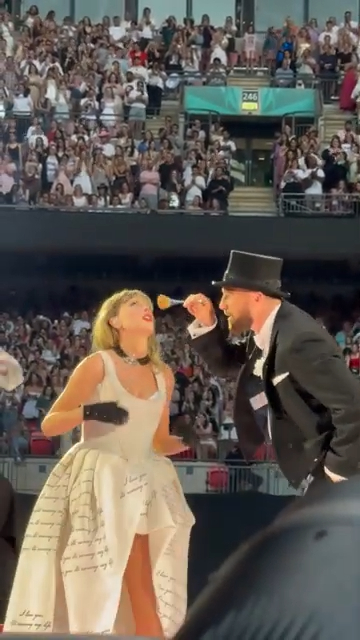 Taylor Swift is joined on stage by Travis Kelce at the Eras tour.