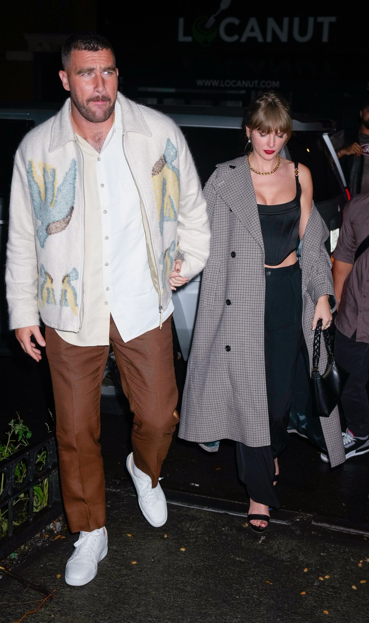 Travis Kelce and Taylor Swift arrive at SNL Afterparty on October 15, 2023 in New York City.