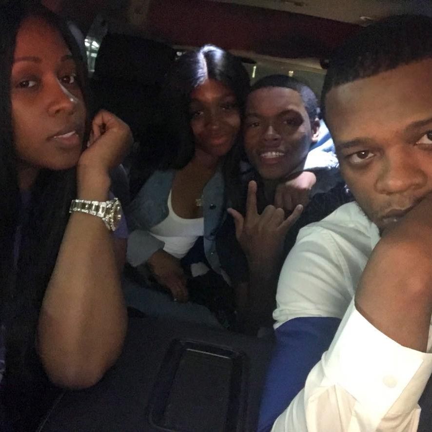 Remy Ma, her son, a woman and Papoose in the car.