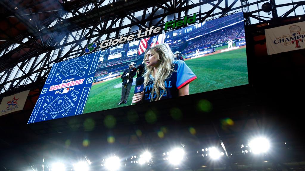 Ingrid Andress singing the national anthem at the MLB Home Run Derby. 