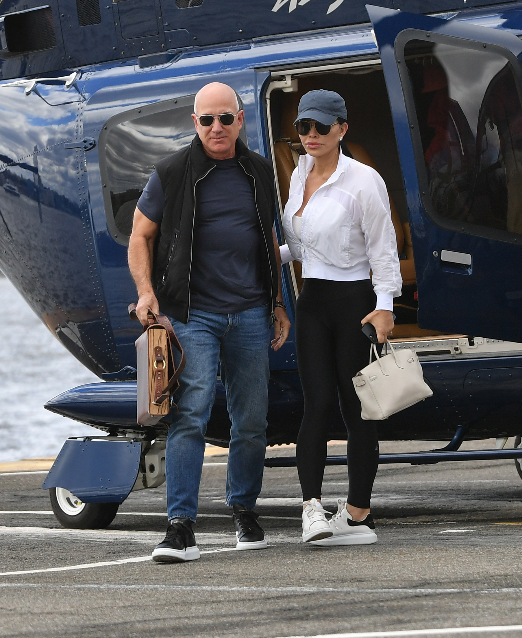 Jeff Bezos and Lauren Sánchez walking together 