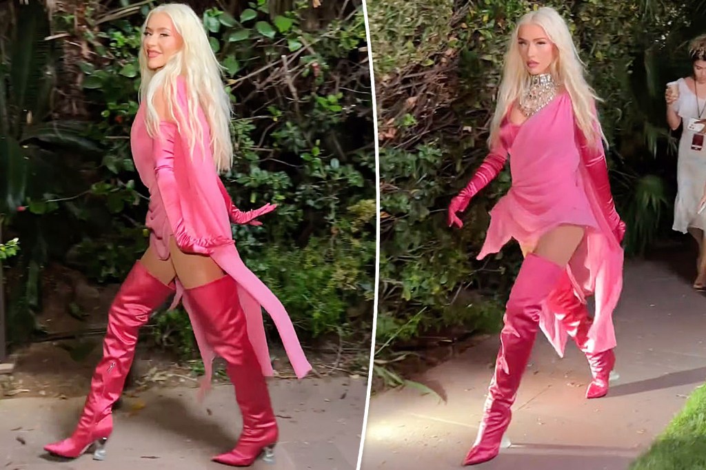 Christina Aguilera struts her stuff in head-to-toe hot pink at Dolce & Gabbana Alta Moda event