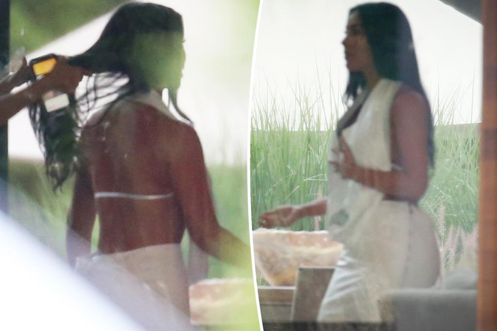 Kim Kardashian stuns in halter top and matching skirt at Michael Rubin’s Fourth of July white party in the Hamptons