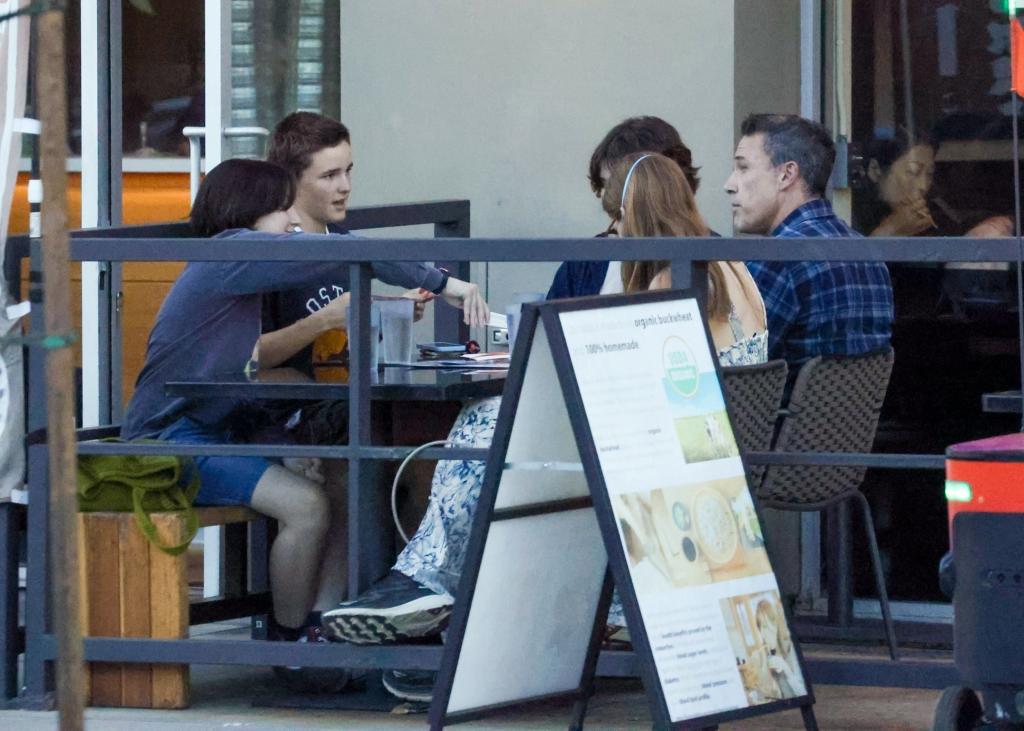 Ben Affleck sitting with Violet and Seraphina Affleck