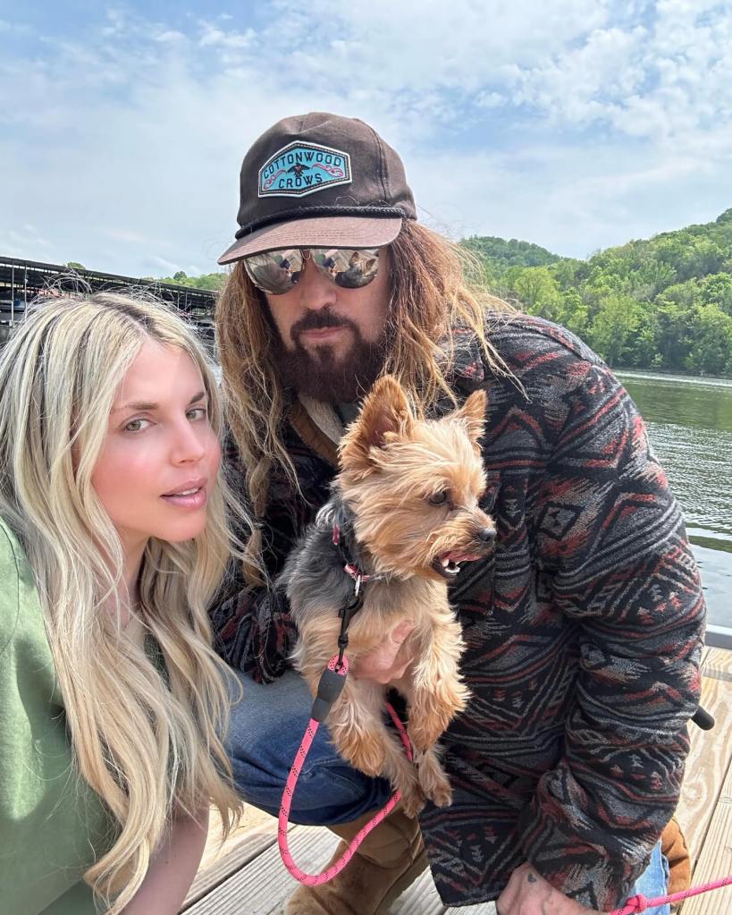 Billy Ray Cyrus, Firerose Cyrus and their dog.