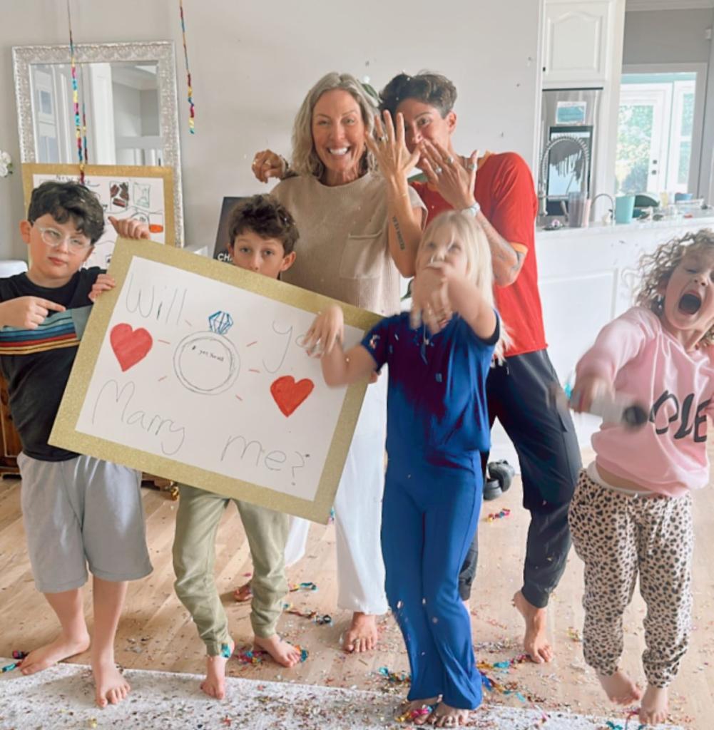 Braunwyn Windham-Burke and Jennifer Spinner posing with Windham-Burke's kids