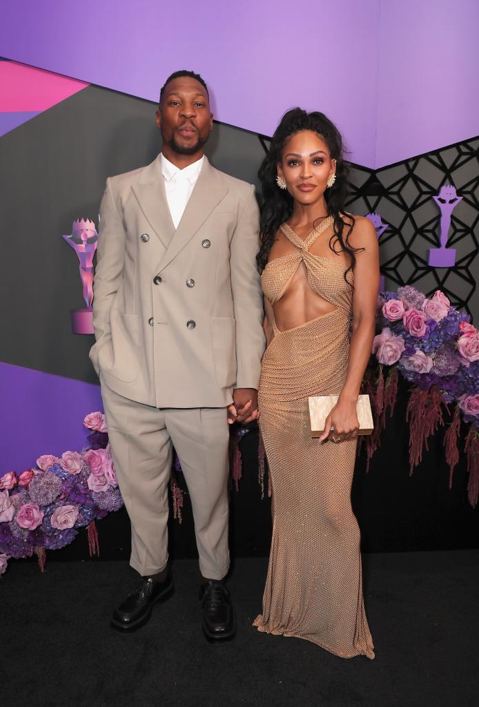 Jonathan Majors and Meagan Good posing together