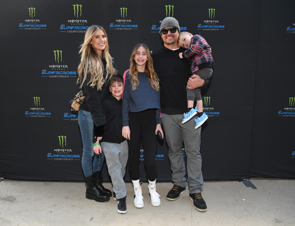 Christina, Josh and her kids attend the Monster Energy Supercross Celebrity Night on Jan. 28, 2023.