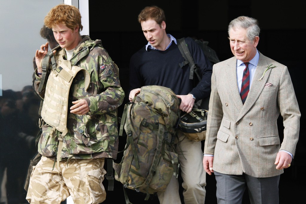 King Charles and brother Prince William as he returns to Britain at Royal Air Force RAF Brize Norton airbase after active service in Afghanistan on March 1,2008.