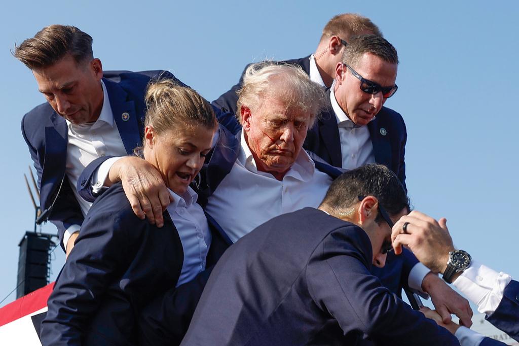 Donald Trump bleeding after he was shot at a Pennsylvania rally