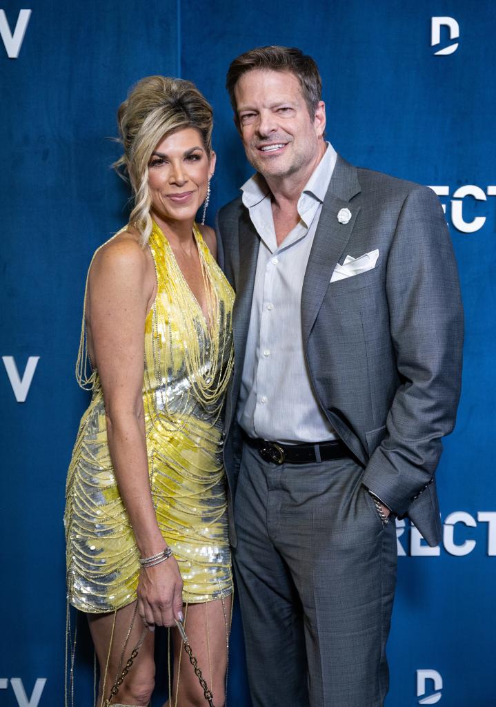 Alexis Bellino and John Janssen posing together