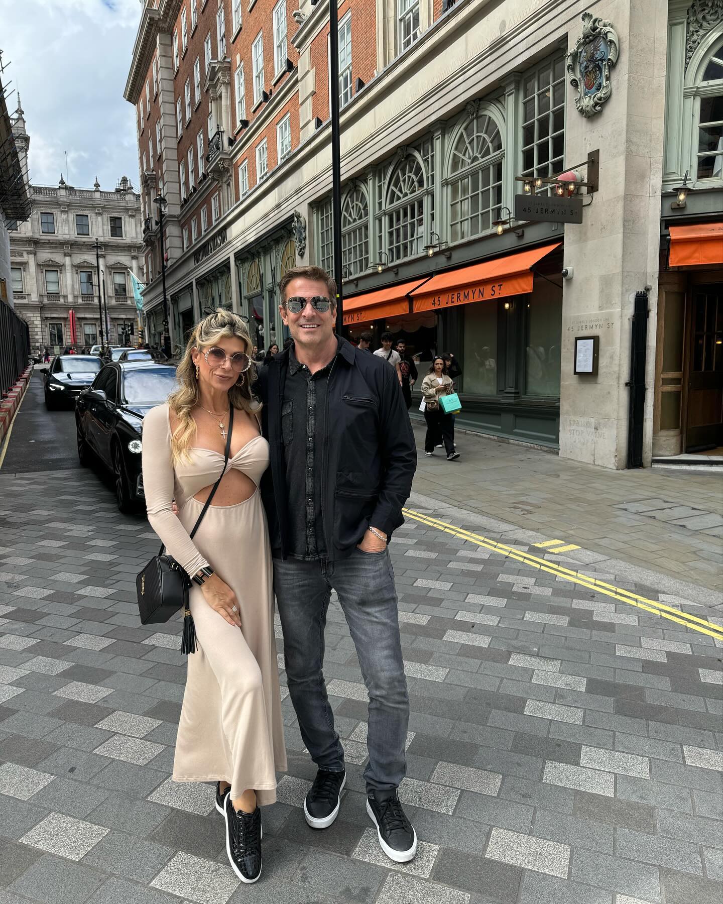 Alexis Bellino and John Janssen posing together 