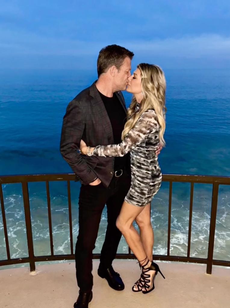 Alexis Bellino kissing John Janssen 