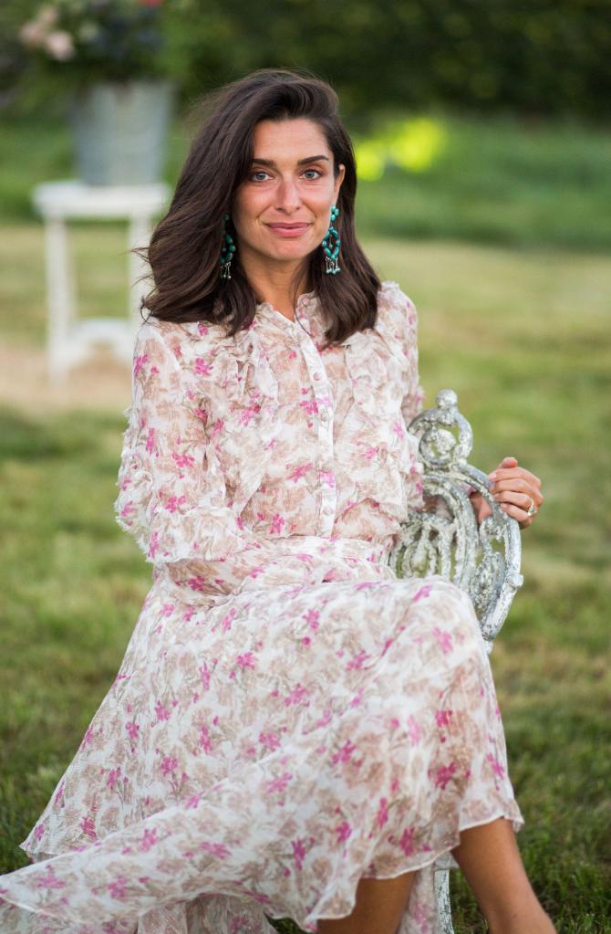 Candice Miller in a floral dress in August 2017.