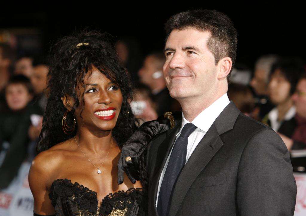 Sinitta and Simon Cowell during 12th Anniversary National Television Awards - Arrivals at Royal Albert Hall in London, Great Britain.