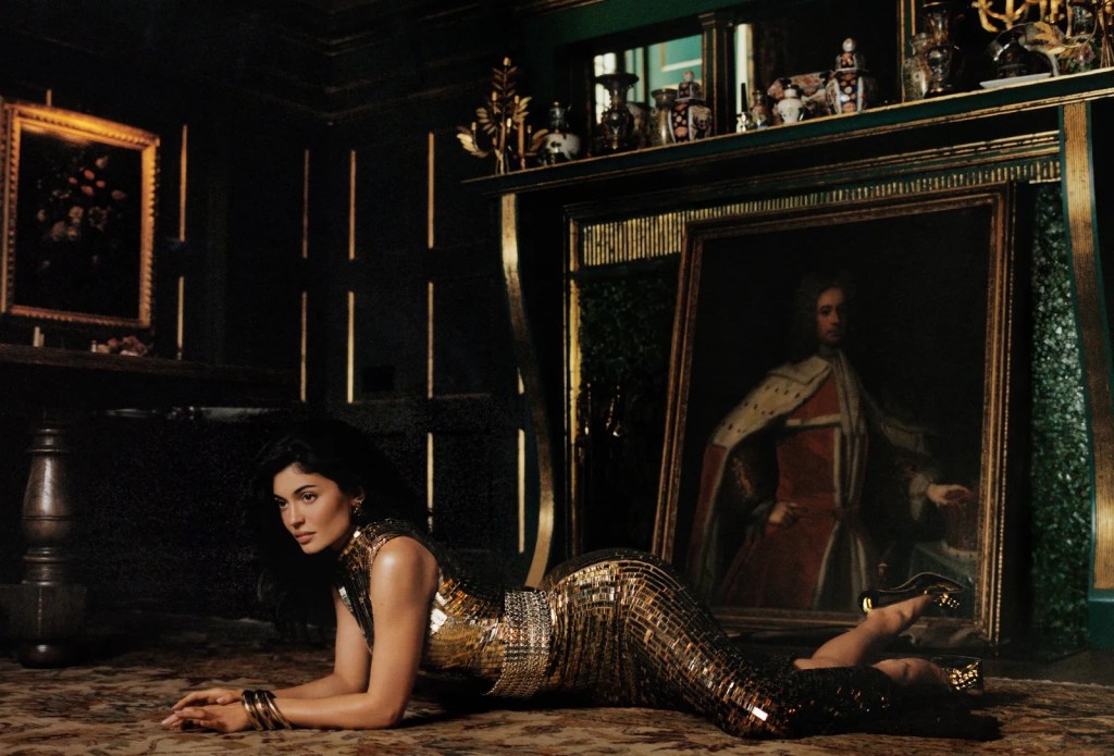 Kylie Jenner wore a gold dress in her British Vogue cover story, published Tuesday.