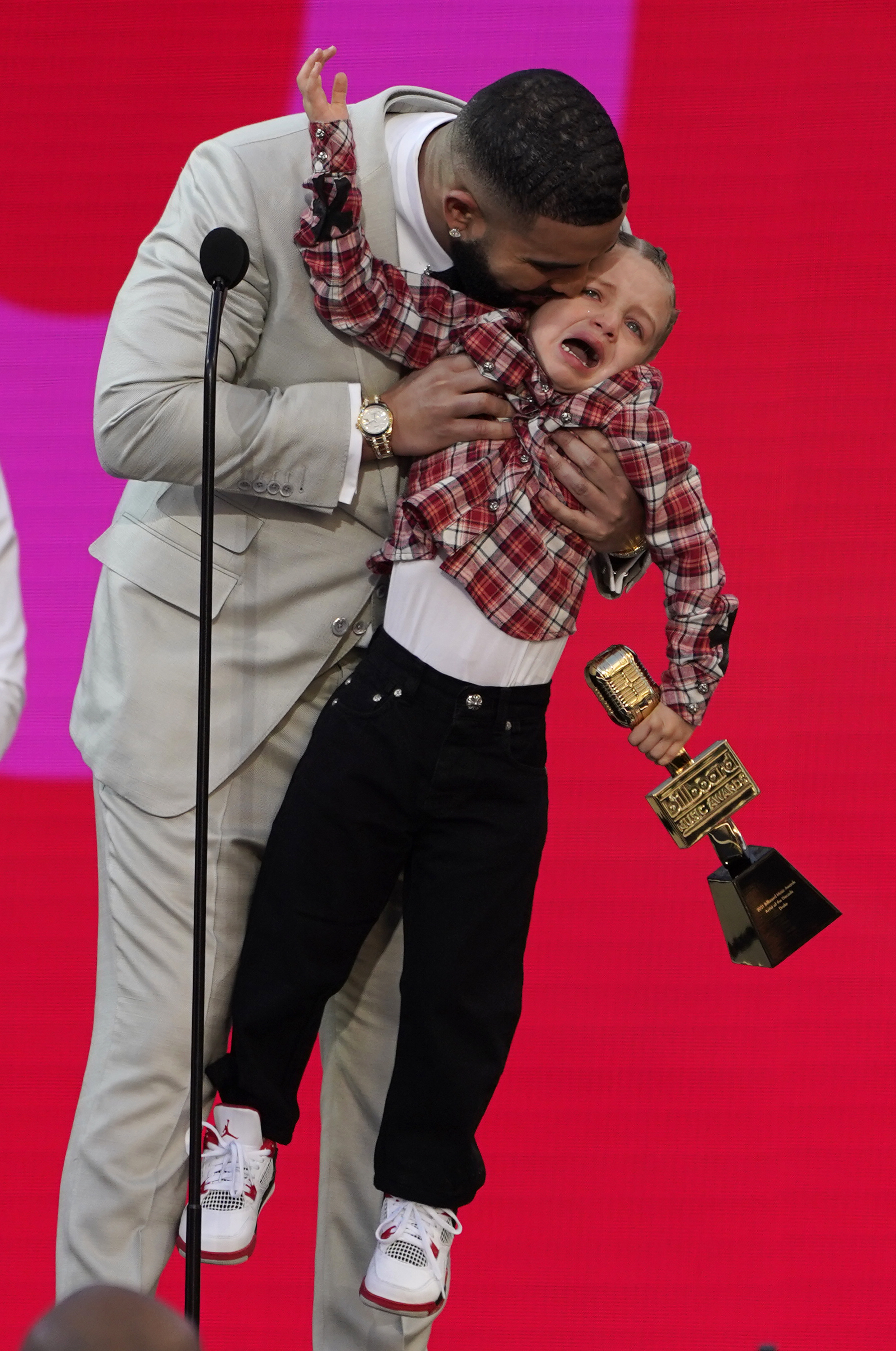 Drake and Adonis Graham at an awards show in May 2021