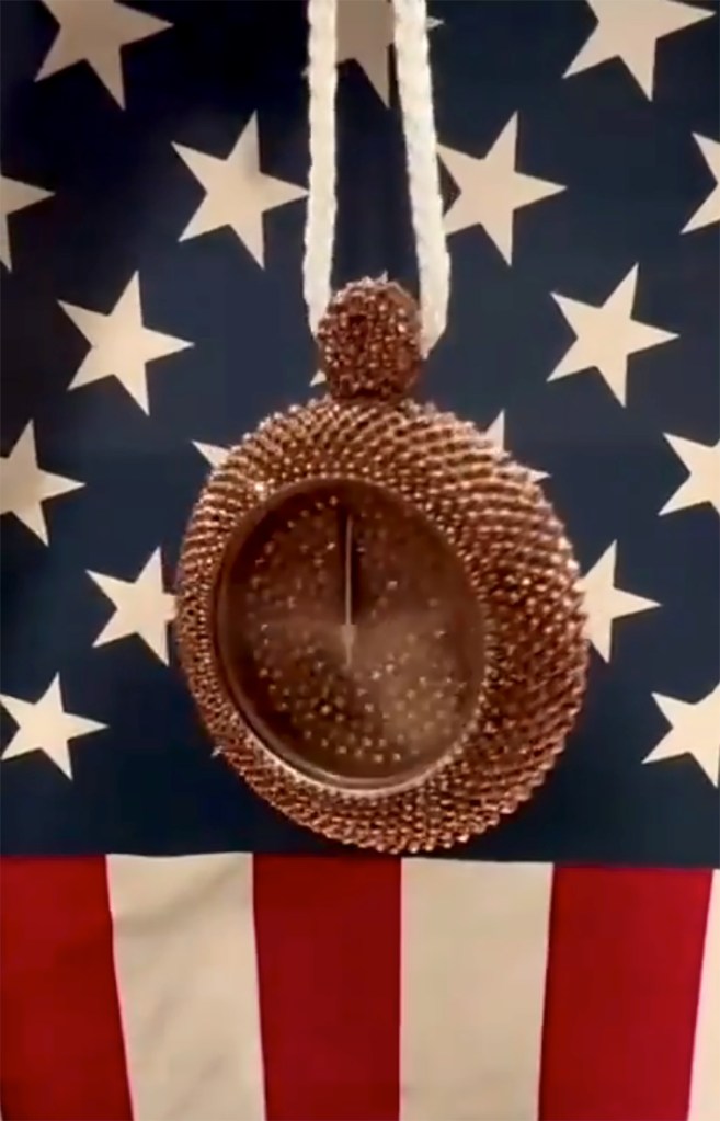 Flavor Flav makes Jordan Chiles custom bedazzled bronze clock necklace after she was stripped of her medal.