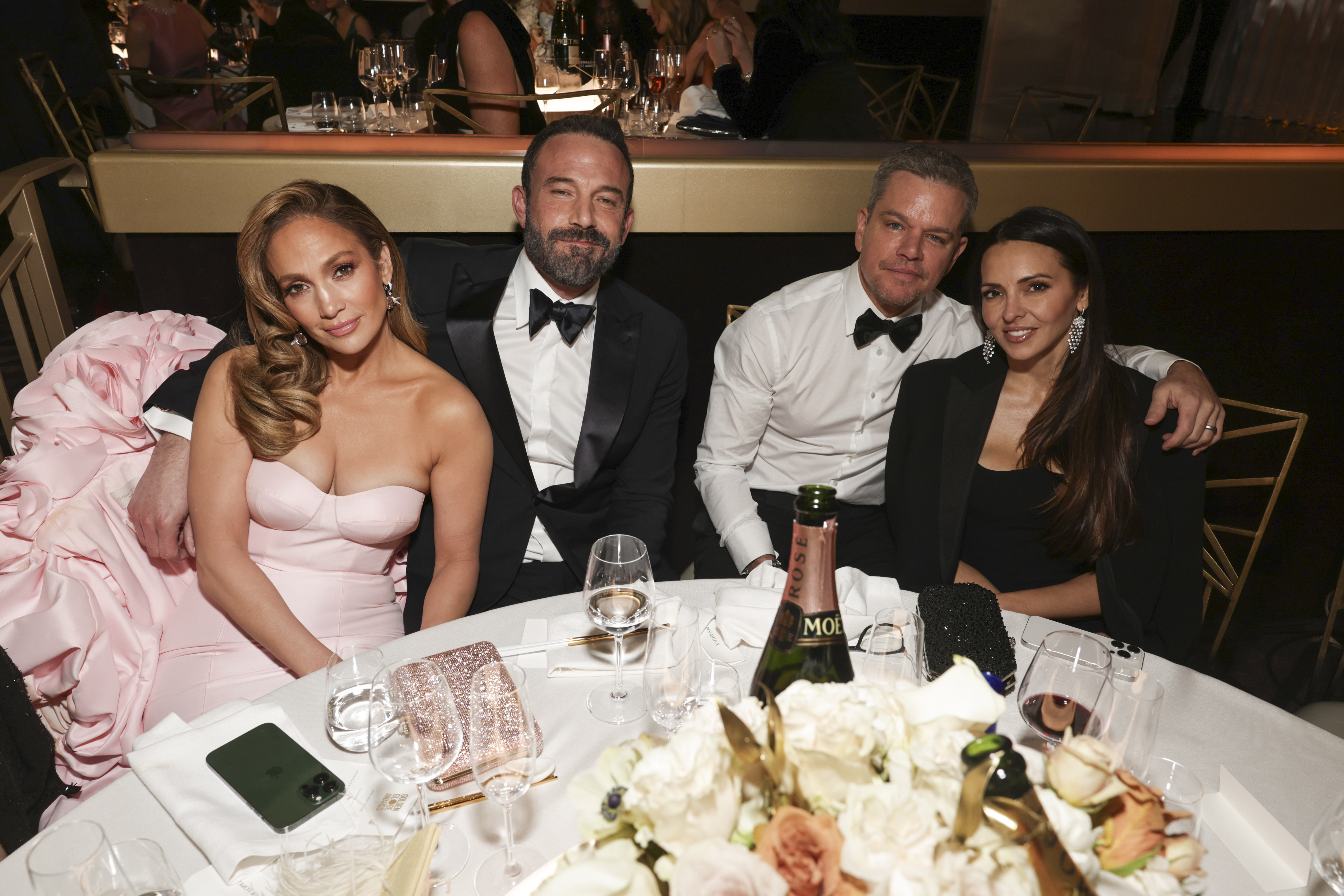 Jennifer Lopez, Ben Affleck, Matt Damon and Luciana Damon posing together 