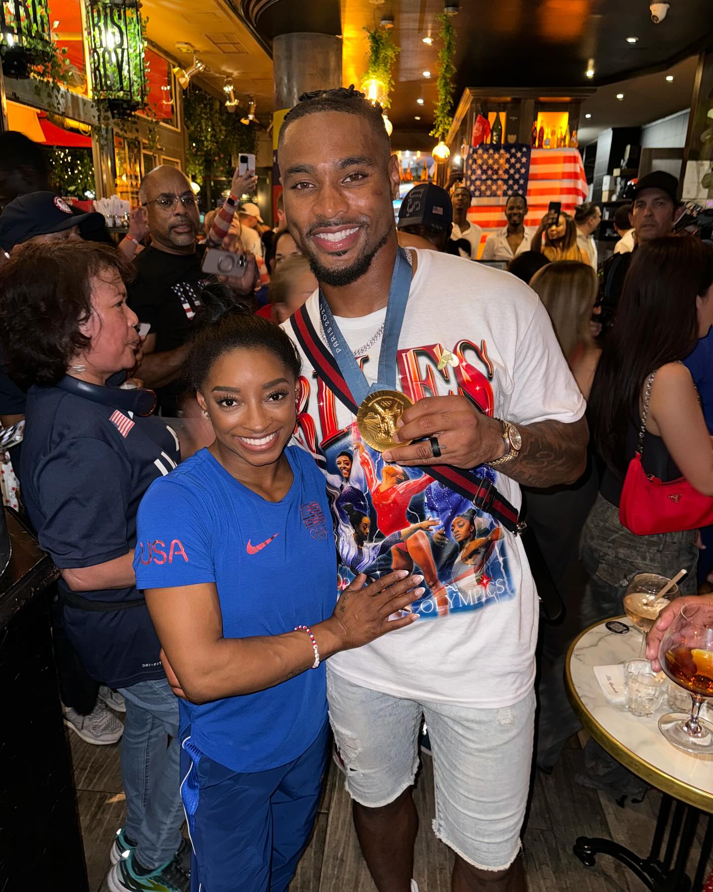 Simone Biles and Jonathan Owens posing for a picture