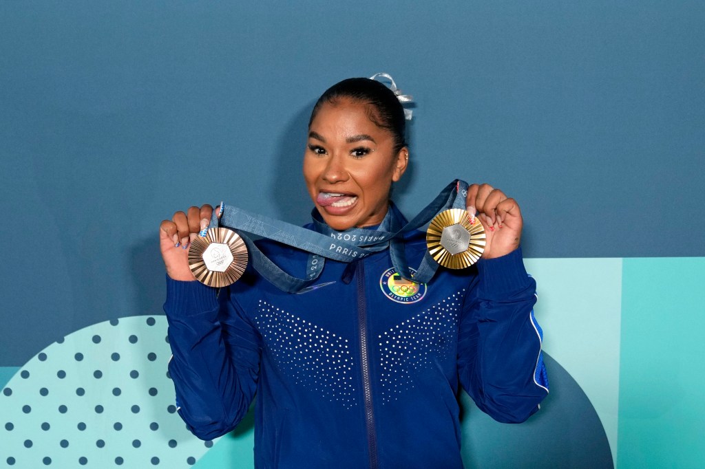 Jordan Chiles of the United States poses for a photo with her gold and bronze medasl after day three of the gymnastics event finals during the Paris 2024 Olympic Summer Games. 