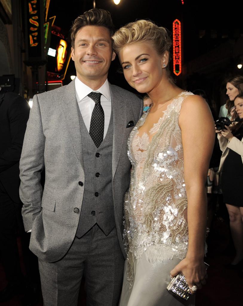 Julianne Hough on the red carpet with Ryan Seacrest in 2013.