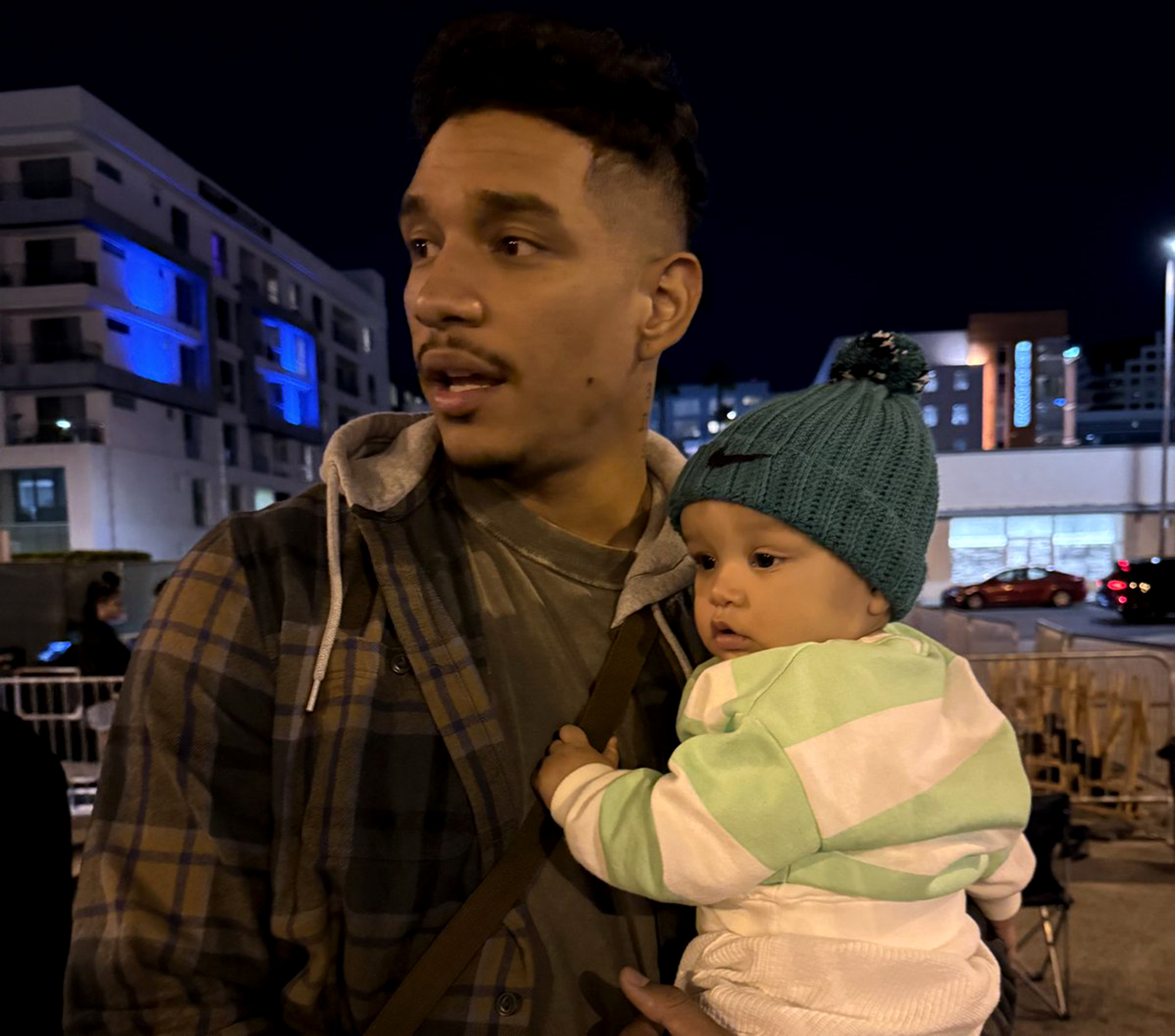 Darius Jackson holding his son.