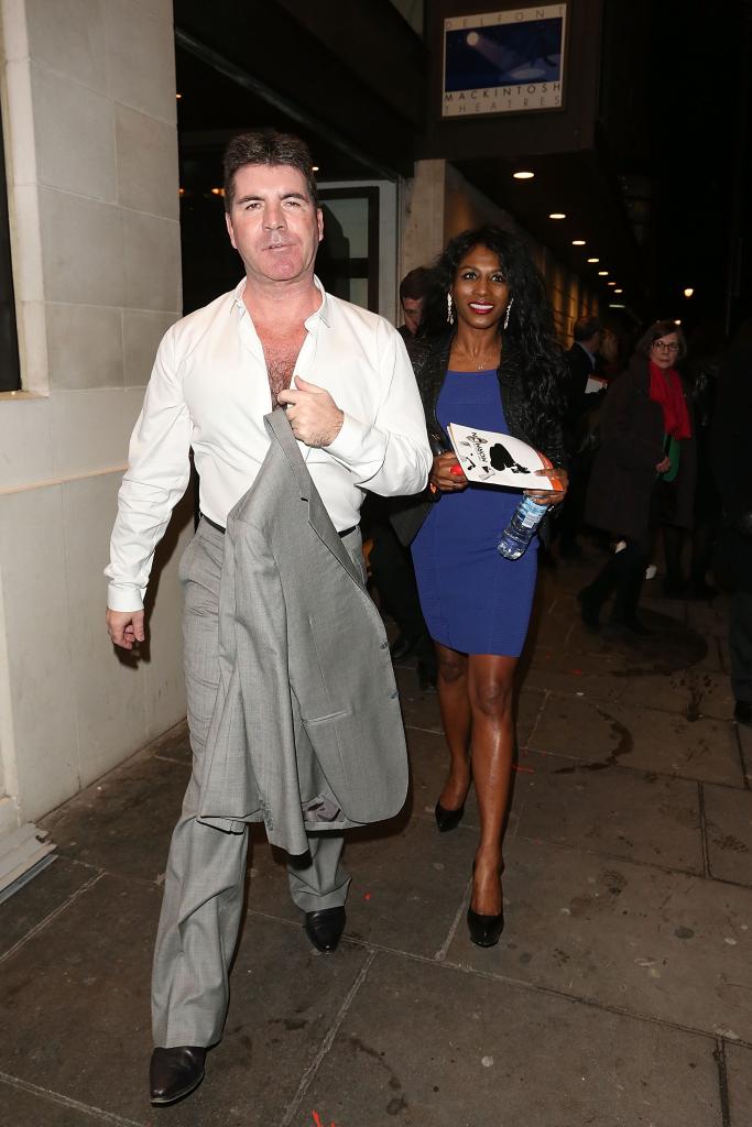 Simon Cowell and Sinitta are seen leaving the "Book of Mormon" on March 14, 2013 in London, United Kingdom. 