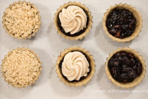 Pastry shells filled and topped for Mincemeat Tarts