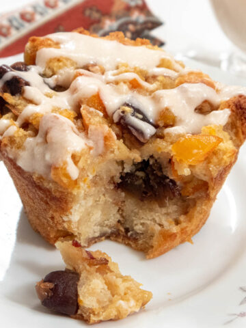 Orange Date Bread Pudding with Hard Sauce drizzled on