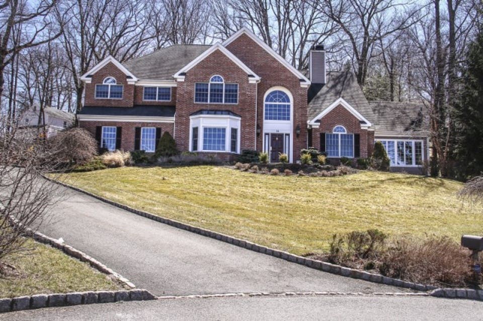 $1.399M Asking Price for 4-Bedroom Tree Top Lane Home